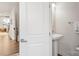 Simple and clean powder room with pedestal sink and modern fixtures at 1326 Gleason Way, Charlotte, NC 28217