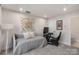 Versatile bedroom with day bed, workspace, and access to bathroom at 1326 Gleason Way, Charlotte, NC 28217