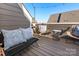 Private rooftop deck with seating area and string lights at 1326 Gleason Way, Charlotte, NC 28217