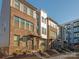 Modern brick townhouses in a row, featuring a clean and contemporary design at 1326 Gleason Way, Charlotte, NC 28217