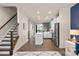 Modern kitchen with island and stainless steel appliances at 1326 Gleason Way, Charlotte, NC 28217