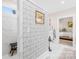 Modern bathroom with a walk-in shower and patterned tile at 137 Deer Run Dr, Troutman, NC 28166