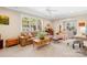 Relaxing living room with a leather sectional sofa and a rustic coffee table at 137 Deer Run Dr, Troutman, NC 28166