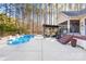 Inviting kidney-shaped pool with wooden deck and pergola at 137 Deer Run Dr, Troutman, NC 28166