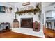 Fireplace with mantel, decorated for the season, and a wood basket at 1542 Colony Rd, Rock Hill, SC 29730