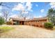 Brick ranch house with screened porch and large backyard at 1542 Colony Rd, Rock Hill, SC 29730