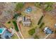 Aerial view of house, yard, pool, and surrounding area at 160 Pampas Ln, Mooresville, NC 28117