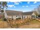 Backyard with wooden fence and deck stairs at 160 Pampas Ln, Mooresville, NC 28117