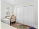 Bright bedroom with built-in desk and ample closet space at 160 Pampas Ln, Mooresville, NC 28117