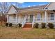 Front porch detail with white railings and steps at 160 Pampas Ln, Mooresville, NC 28117