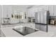 Sleek kitchen with stainless steel appliances and large island at 160 Pampas Ln, Mooresville, NC 28117