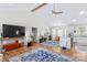 Open concept living room and kitchen with vaulted ceiling at 160 Pampas Ln, Mooresville, NC 28117