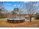 Above ground pool with view of house and trees at 160 Pampas Ln, Mooresville, NC 28117