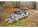 Above ground pool with stone patio and seating area at 160 Pampas Ln, Mooresville, NC 28117