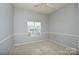 Bedroom with neutral walls and carpet flooring at 16220 Circlegreen Dr, Charlotte, NC 28273