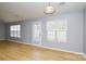 Dining area with wood-look floors and backyard access at 16220 Circlegreen Dr, Charlotte, NC 28273