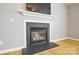 Gas fireplace with slate surround in living room at 16220 Circlegreen Dr, Charlotte, NC 28273