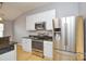 Stainless steel appliances and granite countertops in kitchen at 16220 Circlegreen Dr, Charlotte, NC 28273