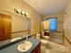 Clean bathroom with shower/tub combo and vanity at 1824 N Charlotte Ave, Monroe, NC 28110