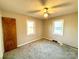 Bright bedroom featuring neutral walls and carpet at 1824 N Charlotte Ave, Monroe, NC 28110