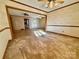 View of the dining area from the living room, carpeted at 1824 N Charlotte Ave, Monroe, NC 28110