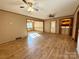 Open living area with hardwood floors, leading to laundry at 1824 N Charlotte Ave, Monroe, NC 28110