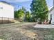 Spacious backyard with grassy area and patio at 2003 Galty Ln, Charlotte, NC 28270