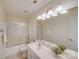 Clean bathroom with shower/tub combo and double vanity at 2003 Galty Ln, Charlotte, NC 28270