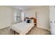 Bright bedroom with double bed, window and carpet flooring at 2003 Galty Ln, Charlotte, NC 28270