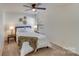 Cozy bedroom featuring a queen-size bed, nightstands, and neutral decor at 2003 Galty Ln, Charlotte, NC 28270