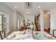 Formal dining room with hardwood floors, chandelier and large window at 2003 Galty Ln, Charlotte, NC 28270