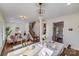 Elegant dining room with hardwood floors, chandelier, and staircase view at 2003 Galty Ln, Charlotte, NC 28270