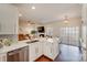 Modern kitchen with island, stainless steel appliances, and breakfast bar at 2003 Galty Ln, Charlotte, NC 28270