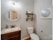 Clean bathroom with updated vanity and floating shelves at 2033 Roscommon Dr, Clover, SC 29710