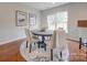 Dining area with round table, four chairs and hardwood floors at 2033 Roscommon Dr, Clover, SC 29710