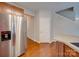 Stainless steel refrigerator in a modern kitchen with wood cabinets at 2033 Roscommon Dr, Clover, SC 29710