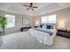 Large main bedroom with tray ceiling and plush bedding at 2033 Roscommon Dr, Clover, SC 29710