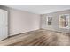 Bright bedroom with new flooring and neutral walls at 212 King George Ln, Gastonia, NC 28056