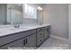 Elegant bathroom with double vanity and marble countertop at 266 Gilead Rd, Huntersville, NC 28078