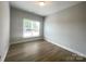Bedroom with natural light and hardwood floors at 266 Gilead Rd, Huntersville, NC 28078