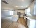 Spacious open-concept kitchen with island, stainless appliances, and bright overhead lighting at 266 Gilead Rd, Huntersville, NC 28078