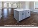 Modern kitchen island with white quartz countertop at 266 Gilead Rd, Huntersville, NC 28078