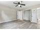 Well-lit bedroom with double closets and wood-look vinyl flooring at 2697 Knotty Pine Dr, Lancaster, SC 29720