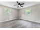 Bright bedroom with ceiling fan, new flooring, and ample closet space at 2697 Knotty Pine Dr, Lancaster, SC 29720