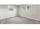 Bright bedroom featuring new flooring and natural light at 2697 Knotty Pine Dr, Lancaster, SC 29720