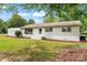 Newly renovated ranch home with a spacious front yard at 2697 Knotty Pine Dr, Lancaster, SC 29720