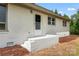 White brick exterior with a charming entrance at 2697 Knotty Pine Dr, Lancaster, SC 29720