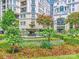 Ornate fountain with colorful flowers and landscaping at 2823 Providence Rd # 154, Charlotte, NC 28211