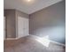 Spacious bedroom with neutral walls and double door closet at 2836 Santiago Cir, Monroe, NC 28110