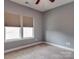 Bright bedroom featuring neutral walls, carpet, and natural light at 2836 Santiago Cir, Monroe, NC 28110